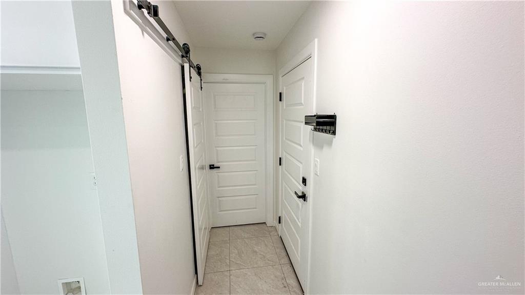 1509 Vida Dulce Weslaco, TX 78596 - Photo 8 of 24 a view of a hallway