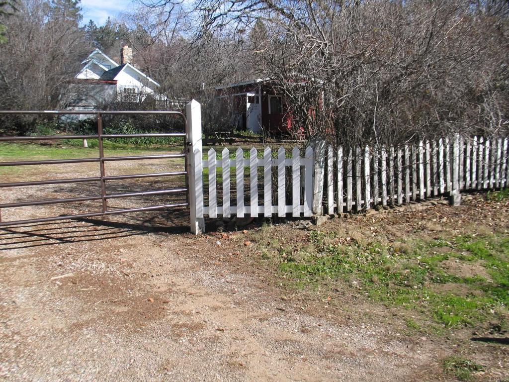 2102 3rd Street Julian, CA 92036 - Photo 3 of 20 a view of a yard with wooden fence