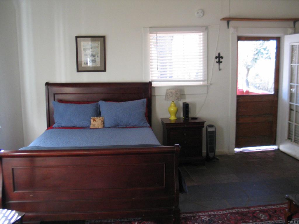 2102 3rd Street Julian, CA 92036 - Photo 8 of 20 a bedroom with a bed and window