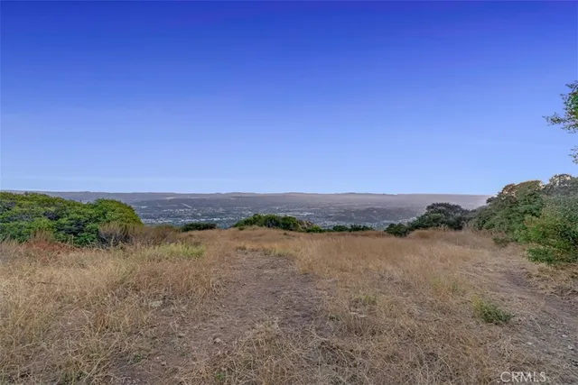 a kitchen with sink counter top space appliances and cabinets