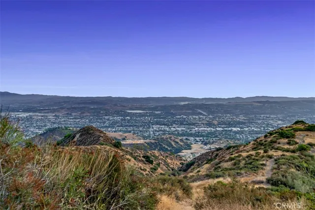 a bedroom with furniture and a bed