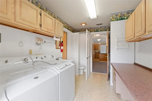 a view of utility room with washer and dryer