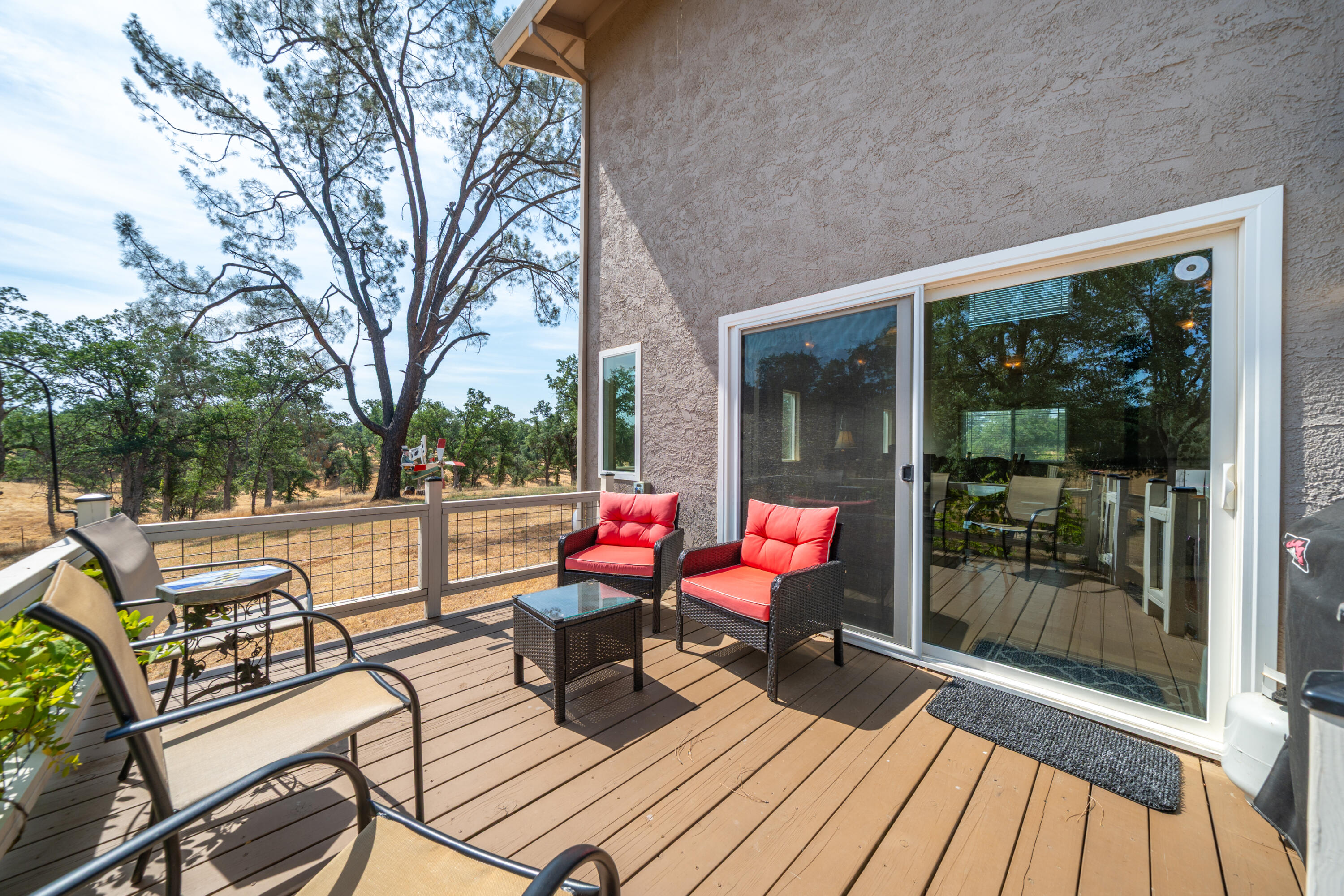 15842 Macleod Drive Redding, CA 96001 - Photo 24 of 36 a wooden bench sitting in front of a building