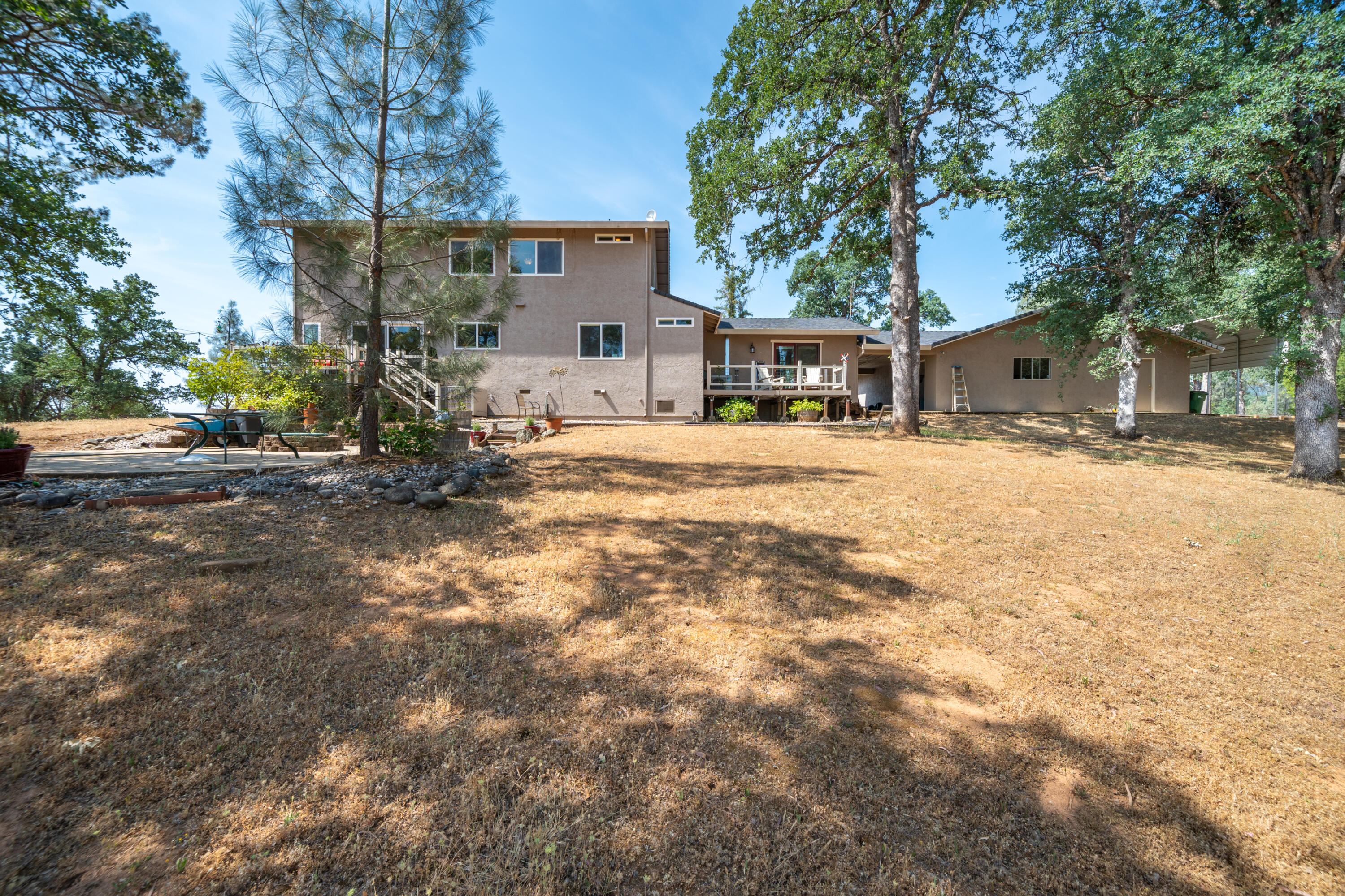 15842 Macleod Drive Redding, CA 96001 - Photo 27 of 36 a view of a house with a yard