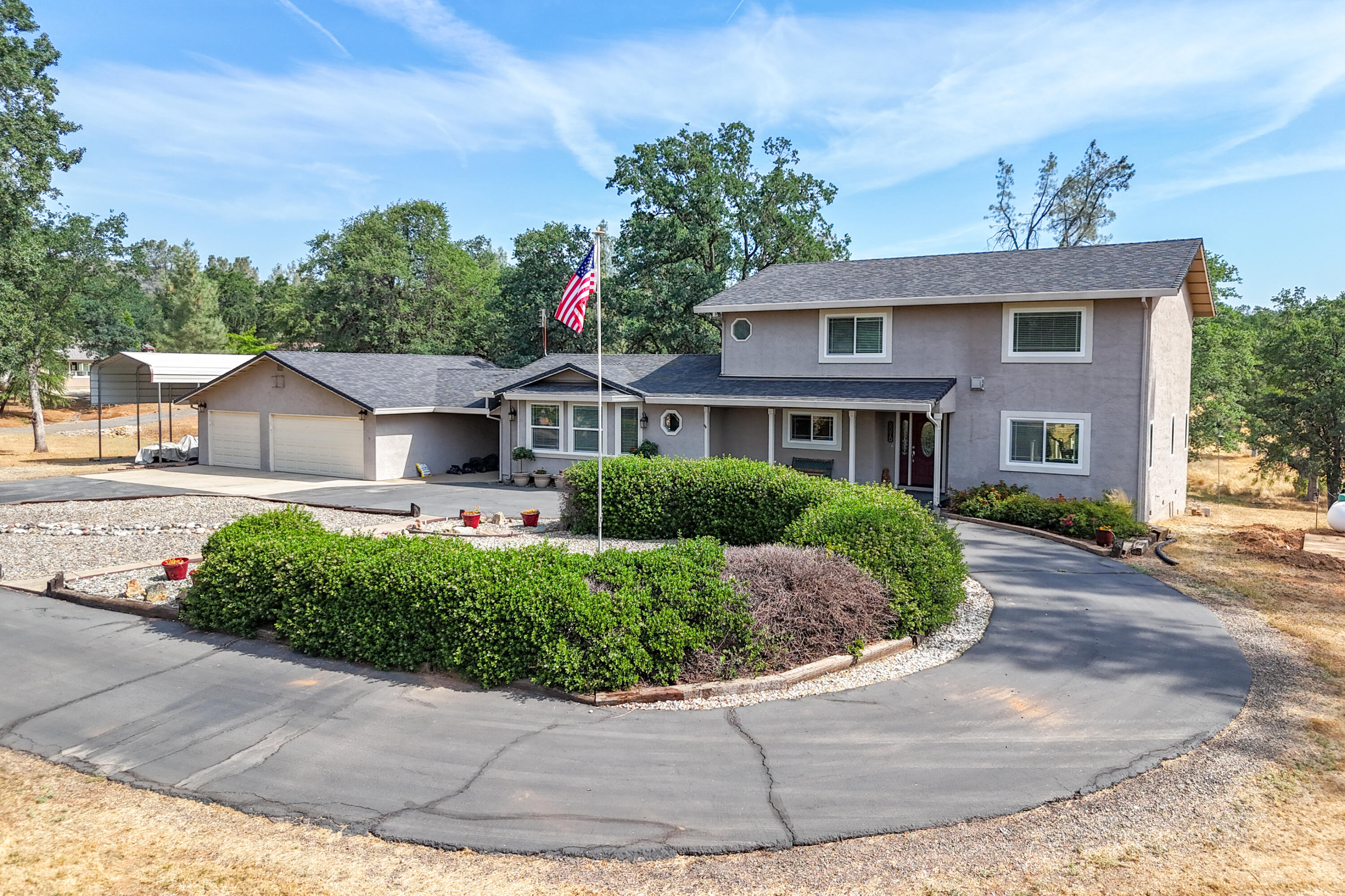 15842 Macleod Drive Redding, CA 96001 - Photo 35 of 36 a front view of house with yard and green space