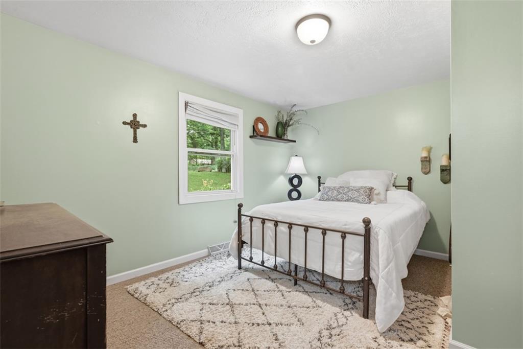 5380 Hardt Road Gibsonia, PA 15044 - Photo 20 of 49 This second bedroom on the main floor has an overhead light and a window that overlooks the front yard.