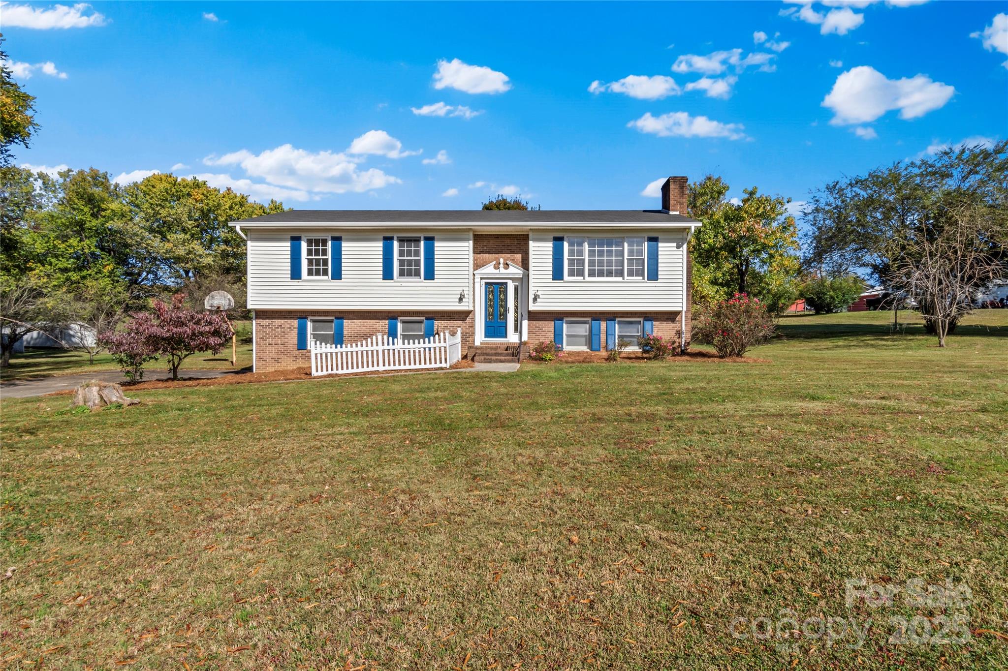 1180 Faulkenberry Road King, NC 27021 - Photo 2 of 40 a front view of a house with a yard