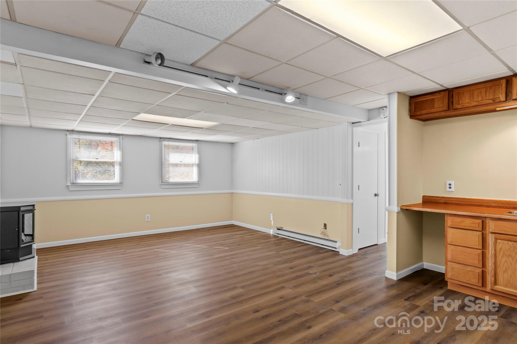 1180 Faulkenberry Road King, NC 27021 - Photo 31 of 40 a view of an empty room with wooden floor and a window