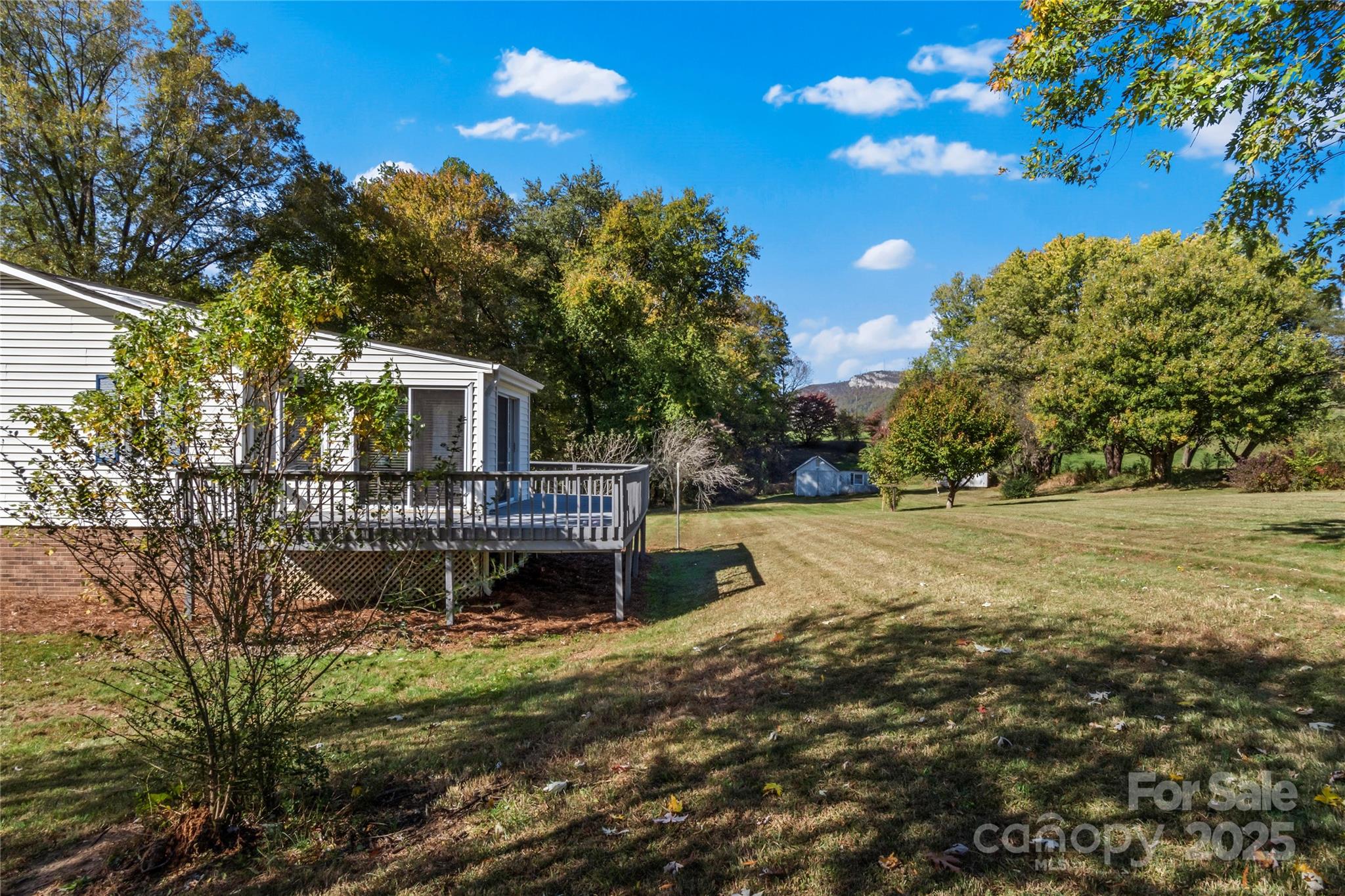 1180 Faulkenberry Road King, NC 27021 - Photo 37 of 40 a view of a house with a yard