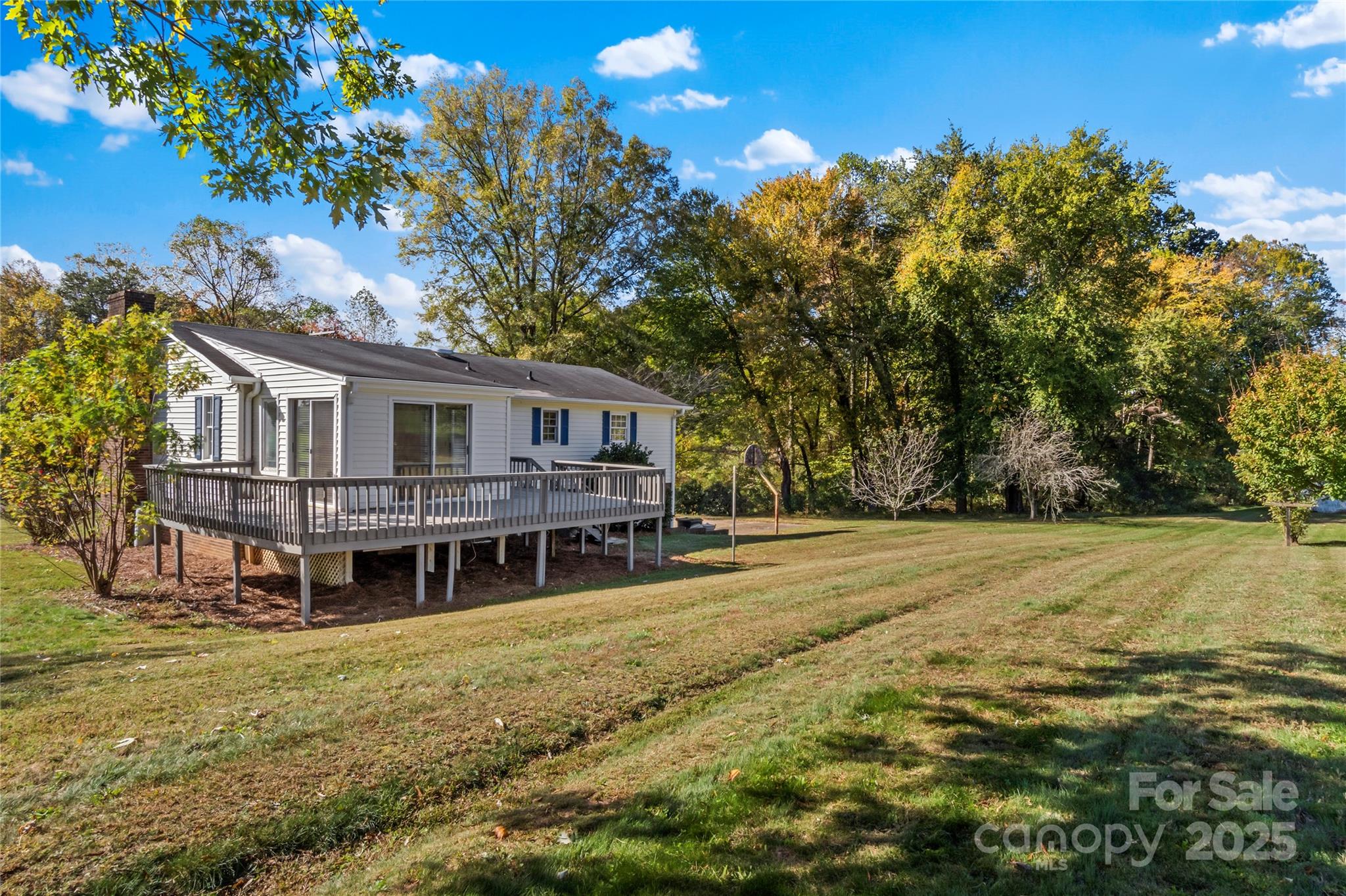 1180 Faulkenberry Road King, NC 27021 - Photo 38 of 40 a front view of a house with a garden