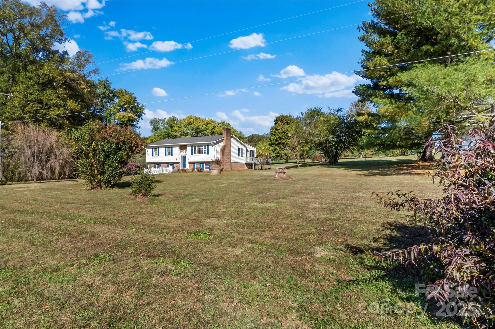 1180 Faulkenberry Road King, NC 27021 - Photo 5 of 40 a view of a house with a yard