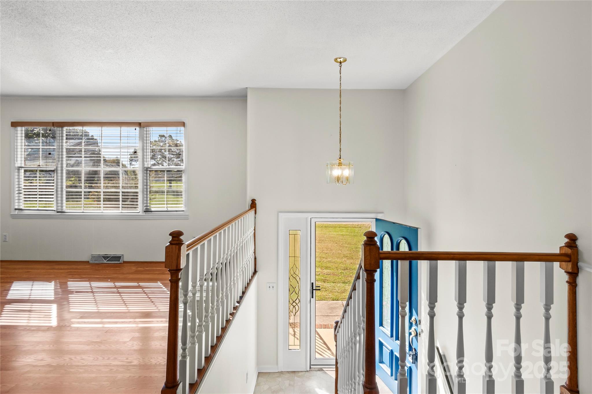 1180 Faulkenberry Road King, NC 27021 - Photo 8 of 40 a view of an entryway with wooden floor