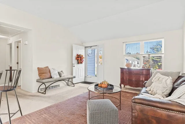 a living room with furniture and a couch