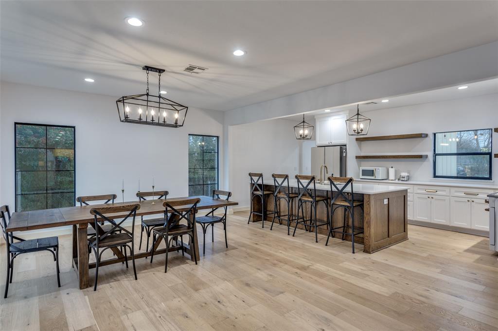 3120 Colcord Avenue Waco, TX 76707 - Photo 7 of 23 a view of a dining area with furniture window and wooden floor