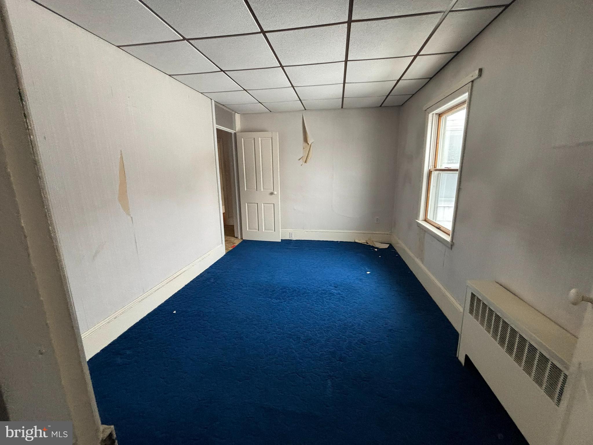 1211 Race Street Ashland, PA 17921 - Photo 5 of 13 a view of an empty room with a window
