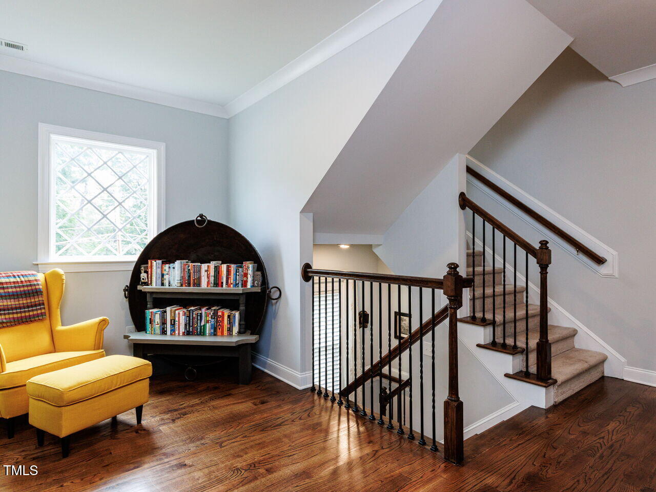 802 Lynn Road Durham, NC 27703 - Photo 13 of 41 Lattice window, beautiful hardwoods, wrought iron spindles, perfect space to read, work, relax.