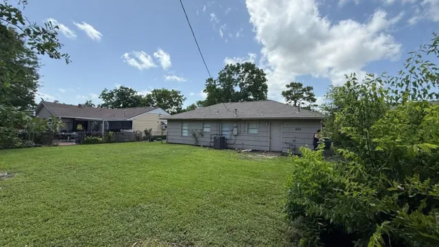 a view of a house with a garden