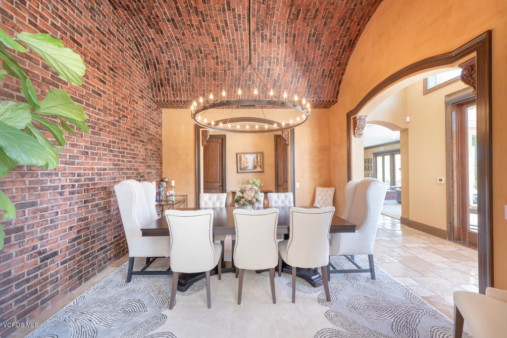 969 Rancho Road Thousand Oaks, CA 91362 - Photo 24 of 54 a view of a dining room with furniture and chandelier