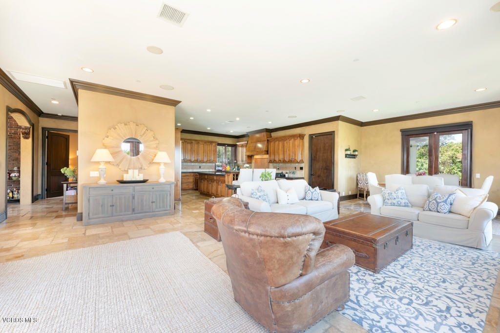 969 Rancho Road Thousand Oaks, CA 91362 - Photo 27 of 54 a living room with furniture and a large window