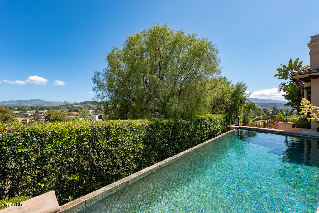 969 Rancho Road Thousand Oaks, CA 91362 - Photo 37 of 54 a view of a floor to ceiling window and a yard