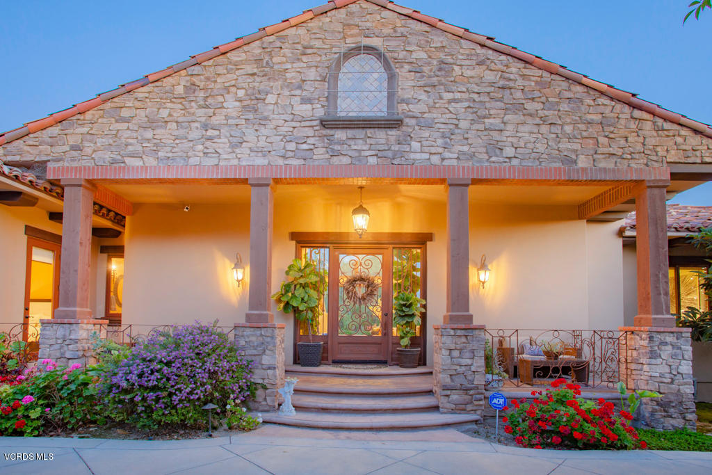 969 Rancho Road Thousand Oaks, CA 91362 - Photo 48 of 54 a front view of a house with a porch