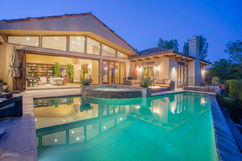 969 Rancho Road Thousand Oaks, CA 91362 - Photo 49 of 54 a view of a swimming pool with a patio