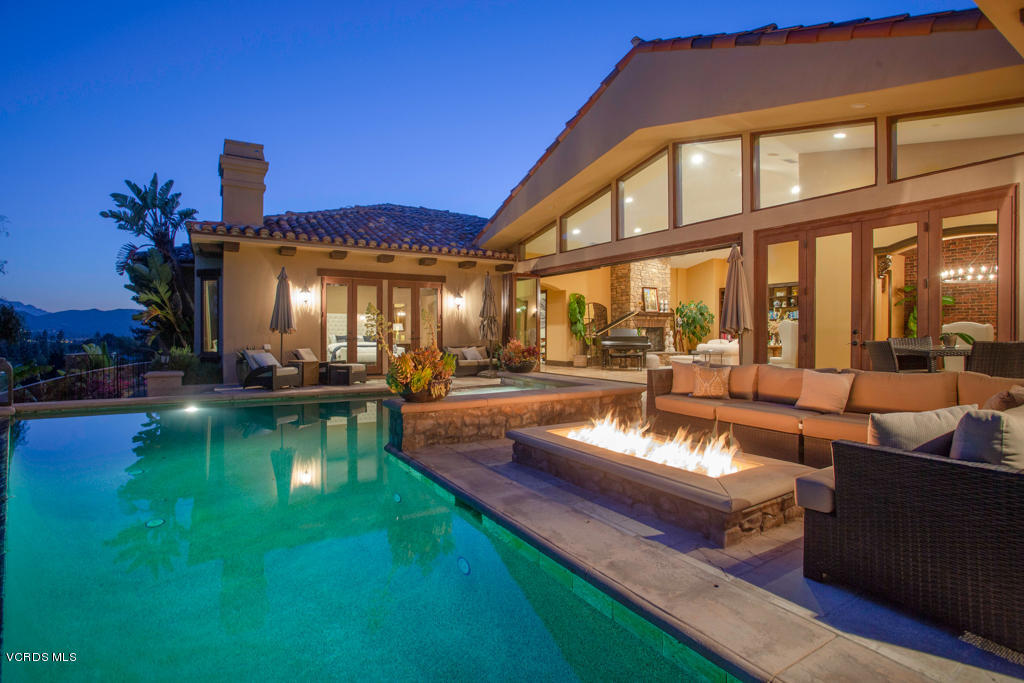 969 Rancho Road Thousand Oaks, CA 91362 - Photo 50 of 54 a view of a house with swimming pool and sitting area