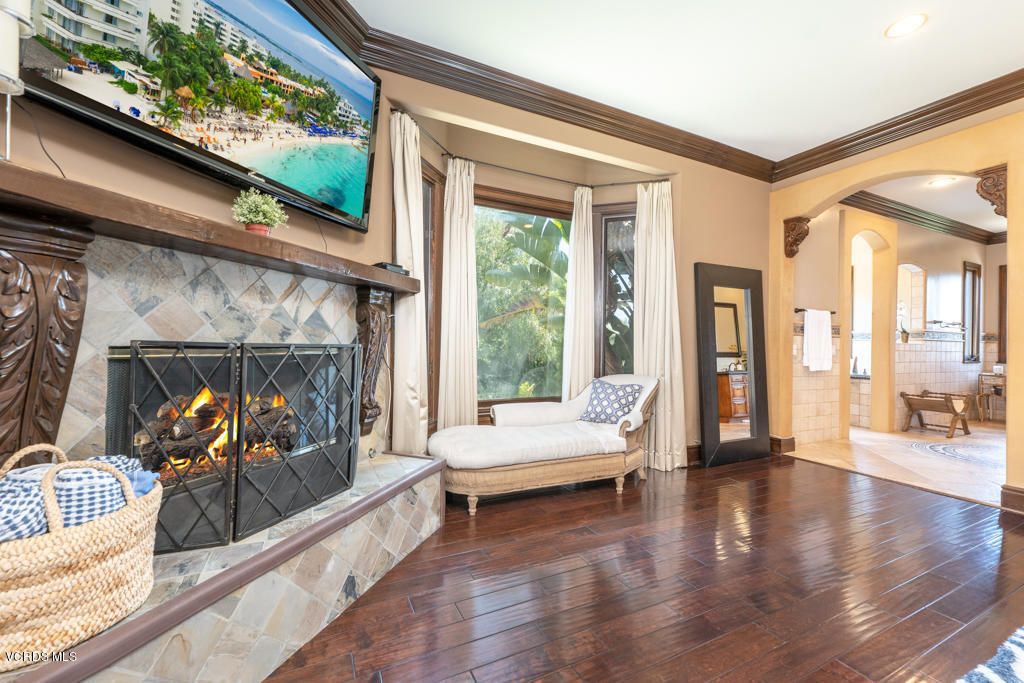 969 Rancho Road Thousand Oaks, CA 91362 - Photo 10 of 54 a living room with furniture and a fireplace