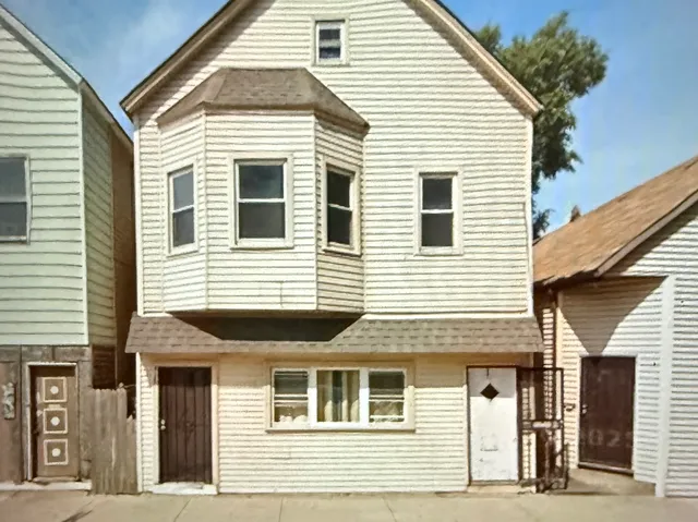 a view of a house with a balcony