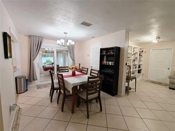 a view of a dining room with furniture