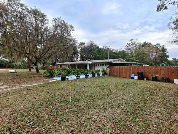 a view of a barn with yard