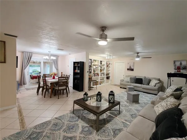 a living room with furniture and a table