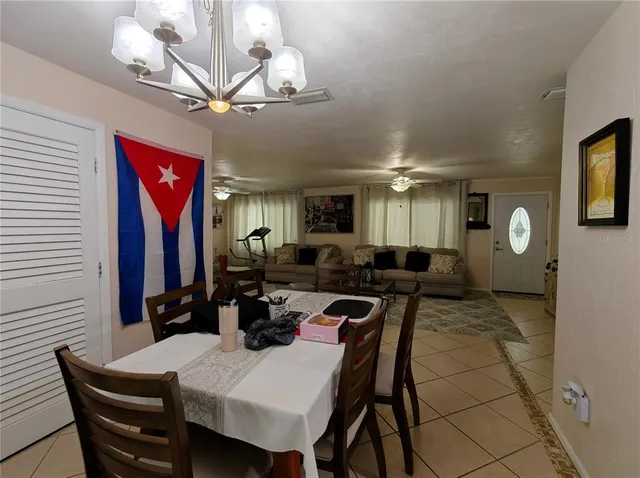 a kitchen with sink a stove and cabinets