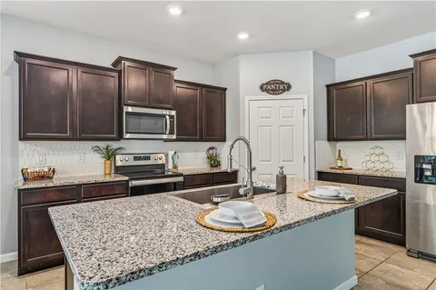 a view of a livingroom with furniture