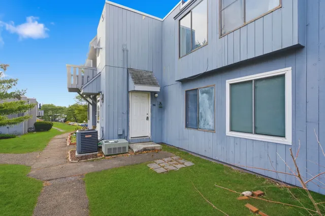 a view of a back yard of the house