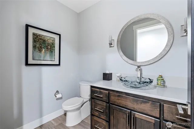 a bedroom with a bed couch and window