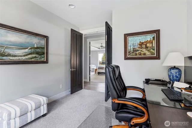 a bedroom with bed and tv