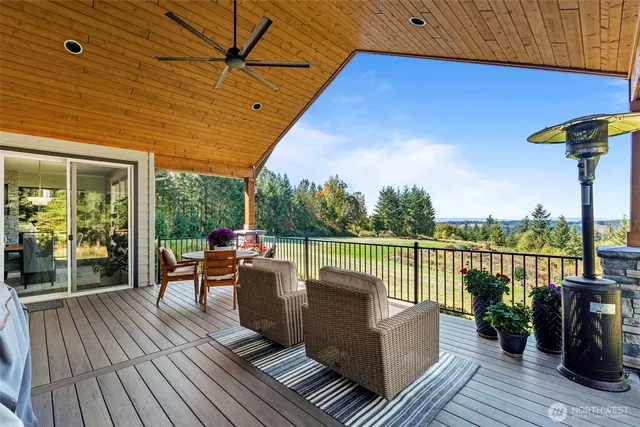 a view of a garden with an outdoor seating