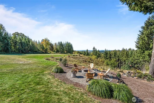 an aerial view of residential house with outdoor space
