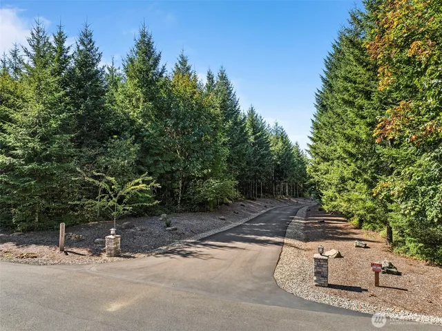a view of a swimming pool with an outdoor space and seating area