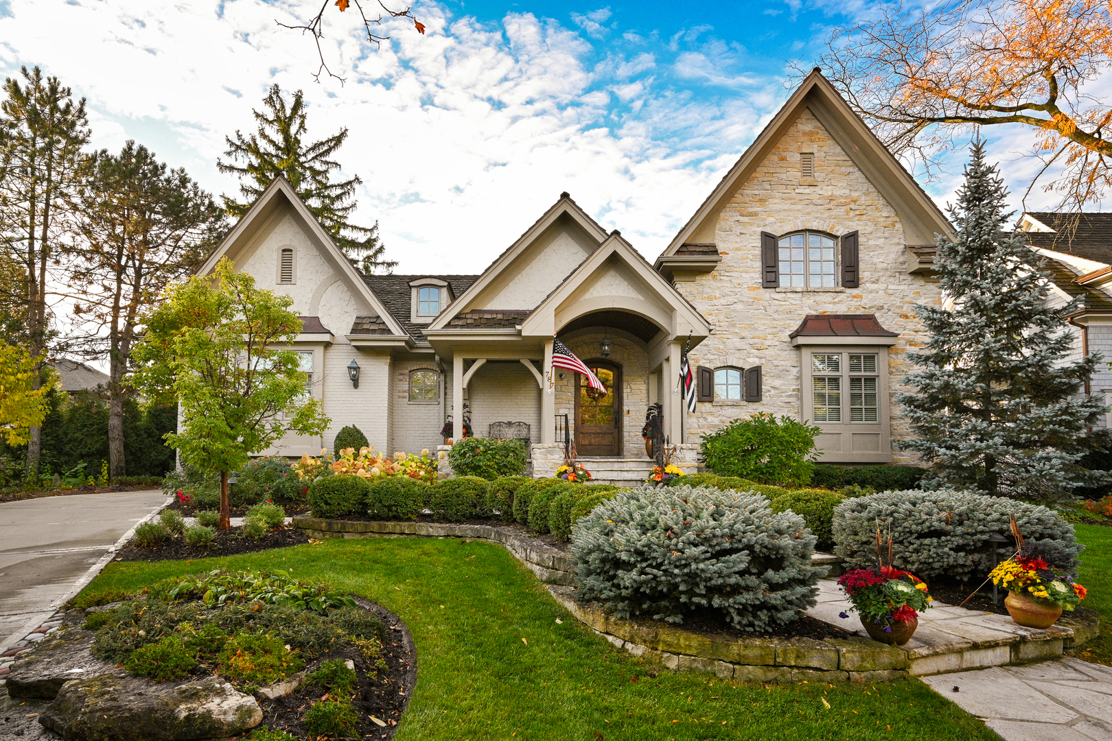 Undisclosed Address Glen Ellyn, IL 60137 - Photo 2 of 45 a front view of a house with a yard