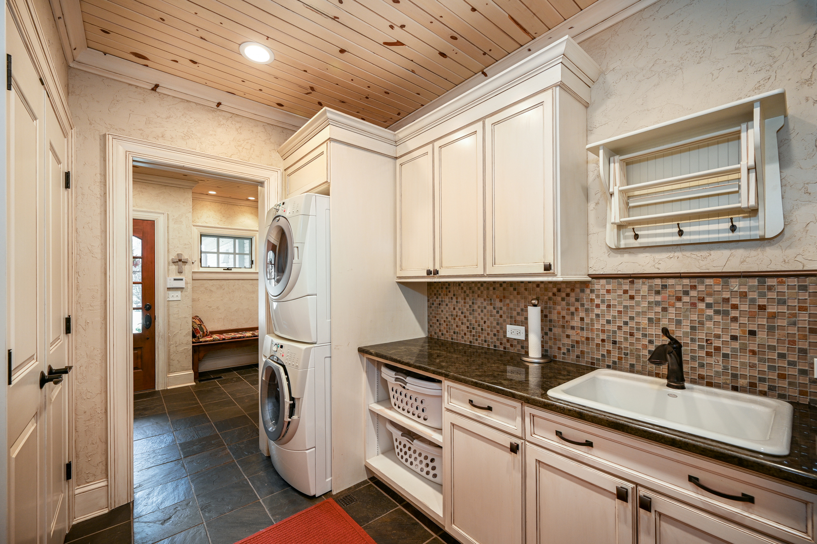 Undisclosed Address Glen Ellyn, IL 60137 - Photo 23 of 45 a kitchen with a refrigerator and cabinets