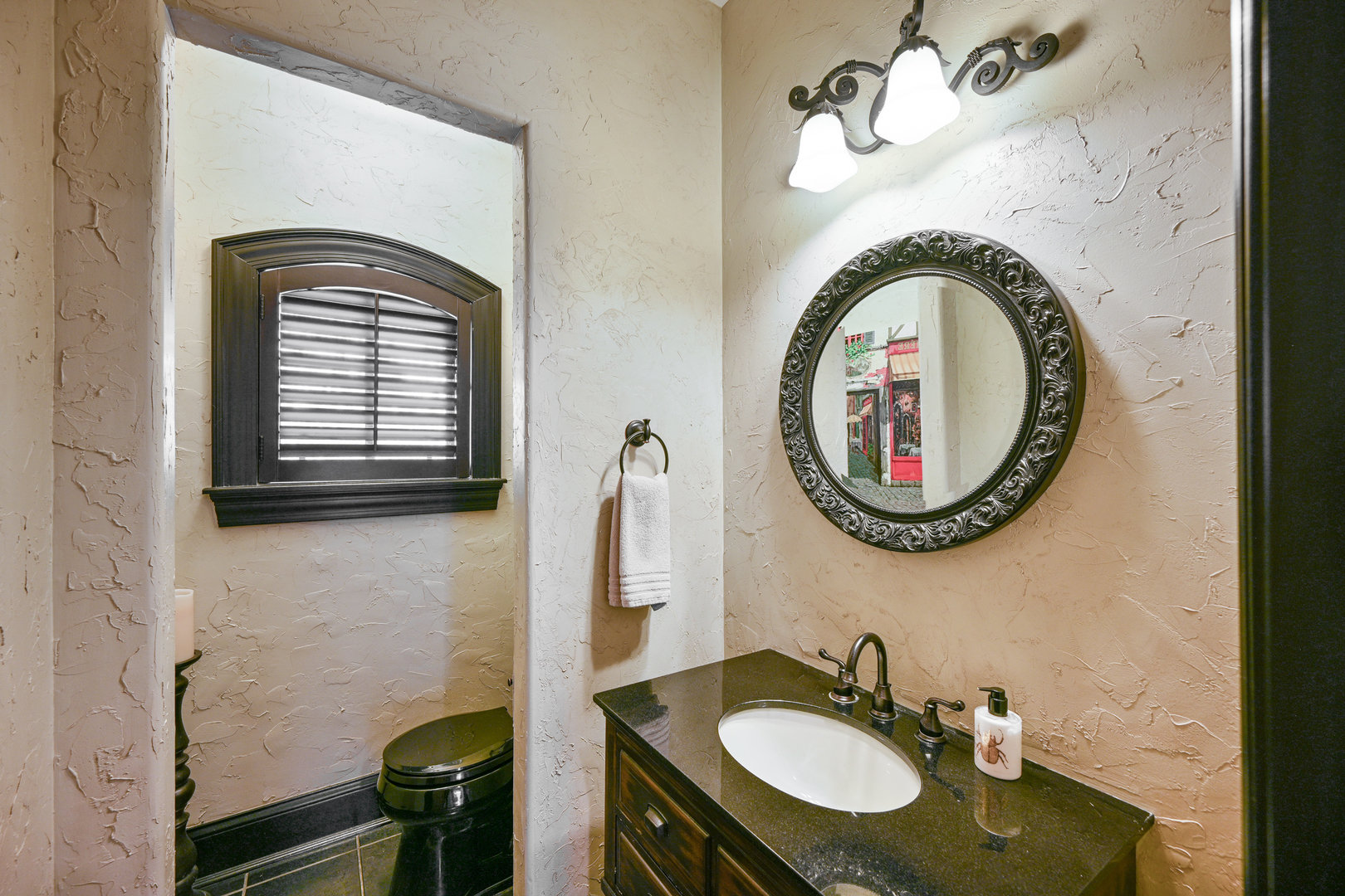 Undisclosed Address Glen Ellyn, IL 60137 - Photo 24 of 45 a bathroom with a sink and a mirror
