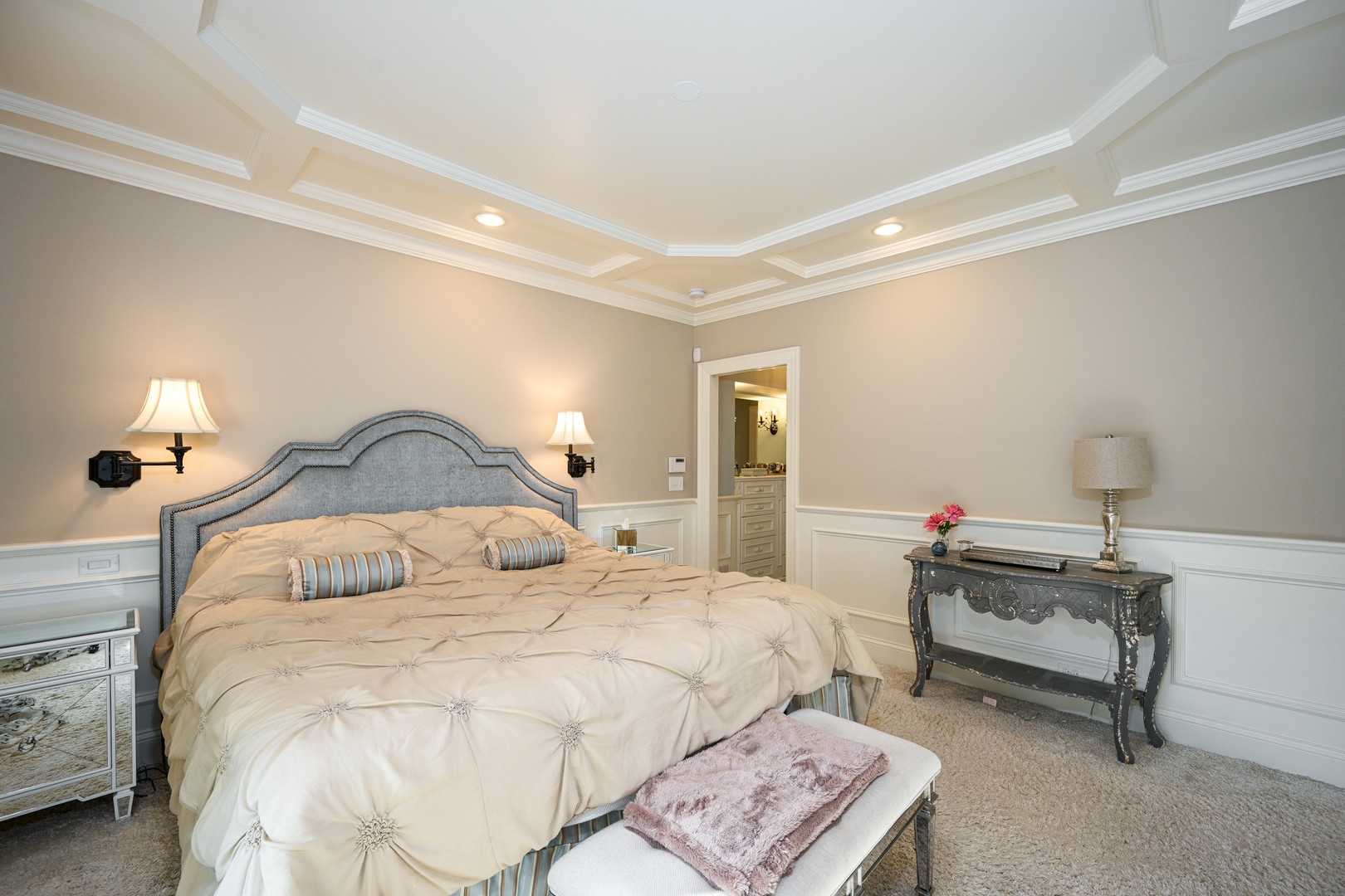 Undisclosed Address Glen Ellyn, IL 60137 - Photo 27 of 45 a bedroom with a bed and a chandelier