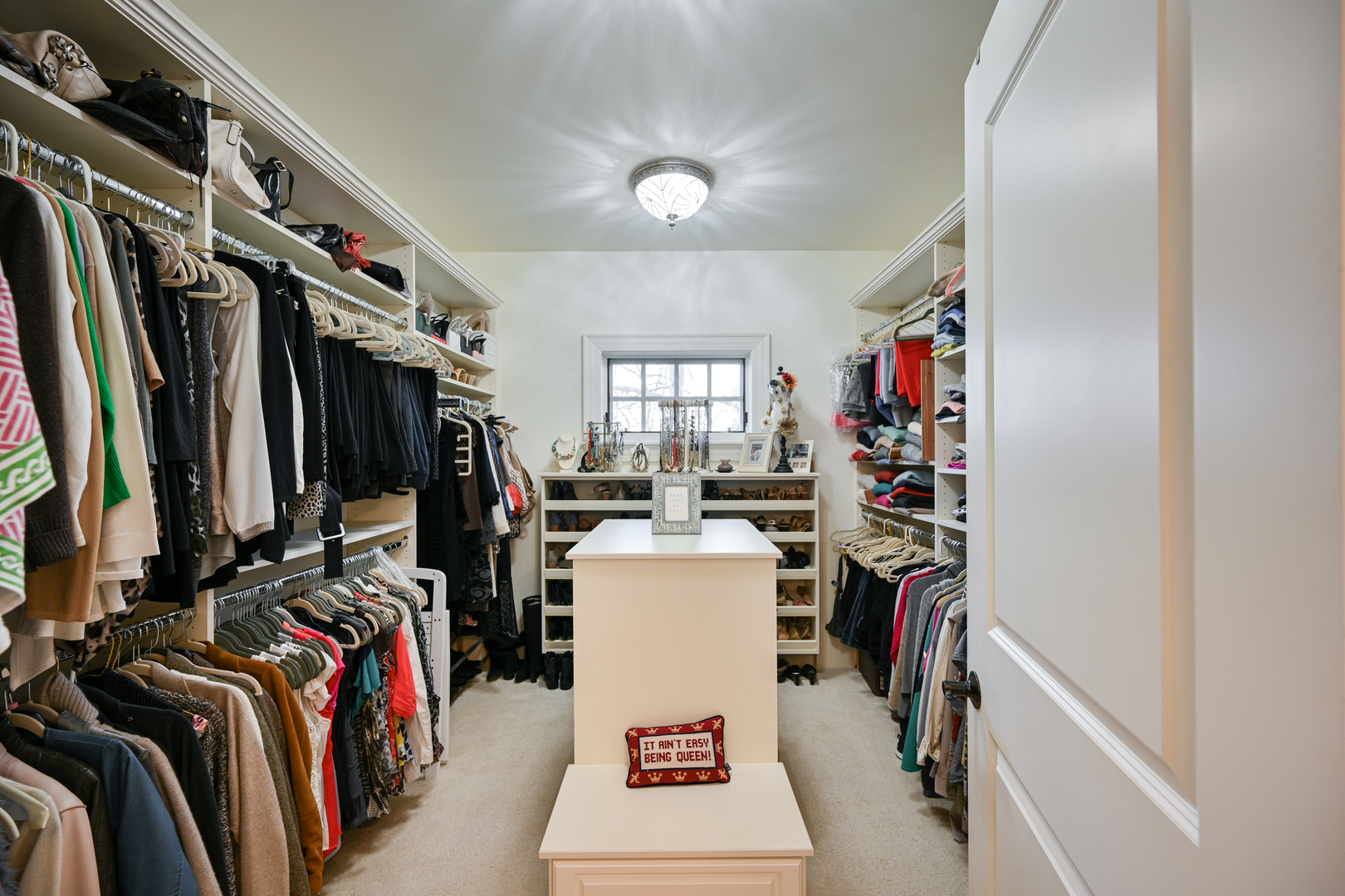 Undisclosed Address Glen Ellyn, IL 60137 - Photo 30 of 45 a view of walk in closet with clothes and shoes