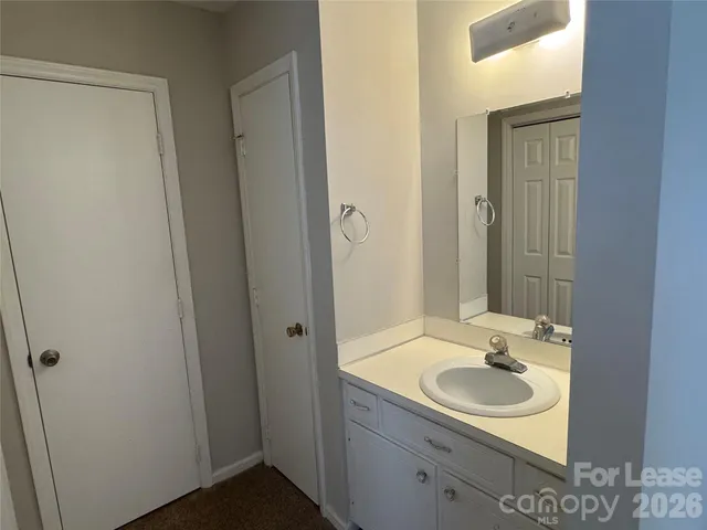 a bathroom with a bath tub and shower