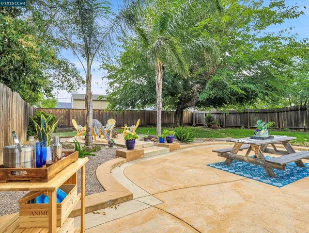 a view of a backyard with a patio
