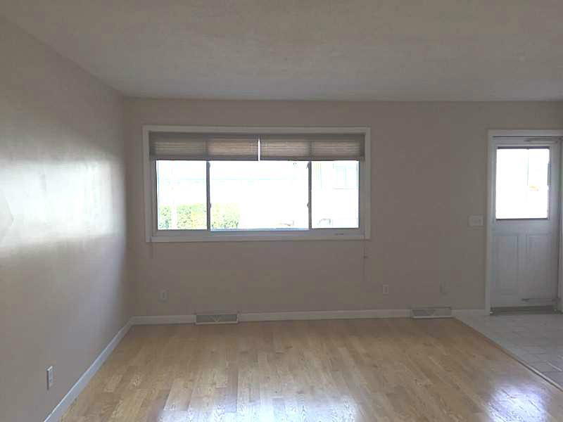 4156 Post Road, Unit 19 Warwick, RI 02818 - Photo 7 of 11 Living Room.