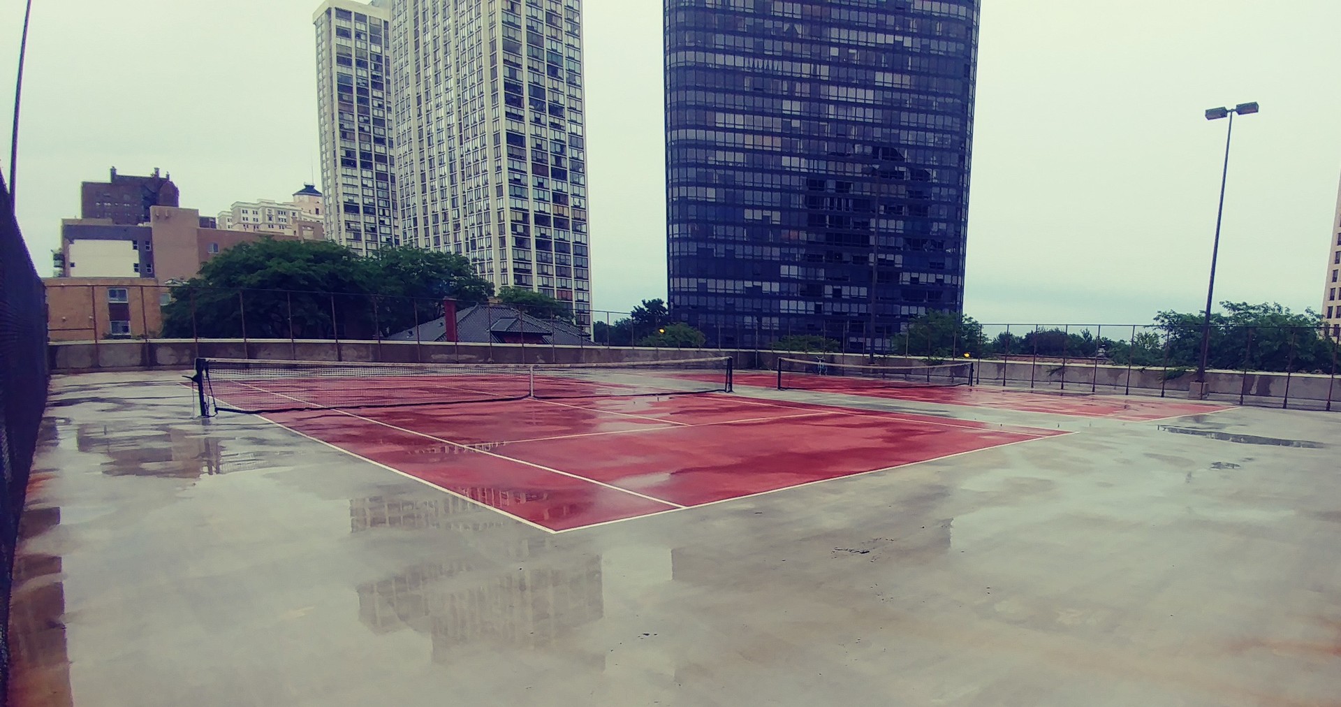 5320 North Sheridan Road, Unit 1207 Chicago, IL 60640 - Photo 20 of 20 a view of a tennis court
