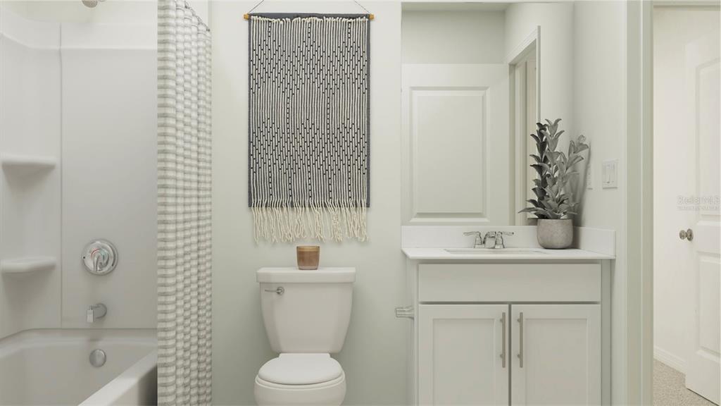 1928 Pine Meadows Golf Course Road Eustis, FL 32726 - Photo 10 of 21 a bathroom with a sink a toilet and shower